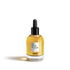 Clear glass bottle with amber nourishing oil and black dropper cap labeled Lazartigue Huile des Reves.